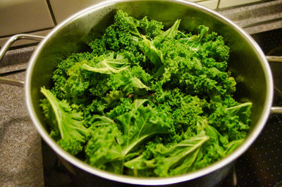 High angle view of green salad in bowl