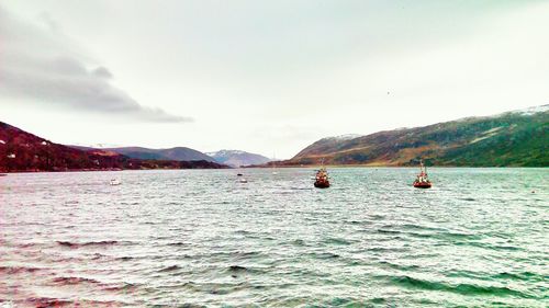 Scenic view of sea against cloudy sky