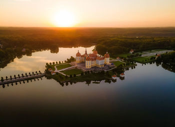 Panoramic aerial view of moritzburg castle on a clear sunny day during sunset, saxony - germany