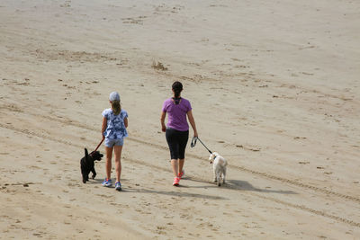 People walking on beach