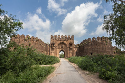 View of historical rohtas fort against cloudy sky