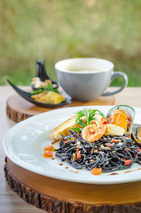 Close-up of food served on table