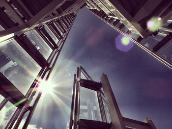 Low angle view of illuminated building against sky