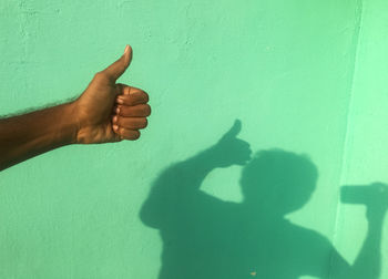 Shadow of people on wall