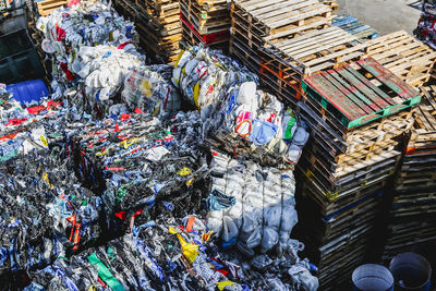 High angle view of garbage for sale at market stall