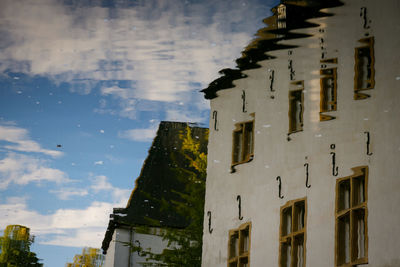 Low angle view of old building against sky