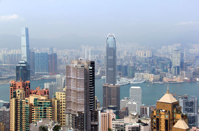 Modern buildings in city against sky