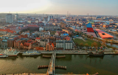 High angle view of river amidst buildings in city