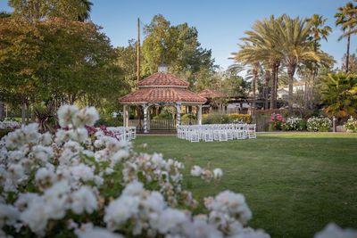 Gazebo in park with building in background
