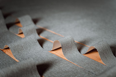 Close-up of gray ribbon on table