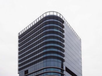 Low angle view of modern building against clear sky