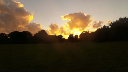 Scenic view of landscape at sunset
