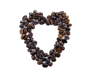 Close-up of heart shape made of coffee