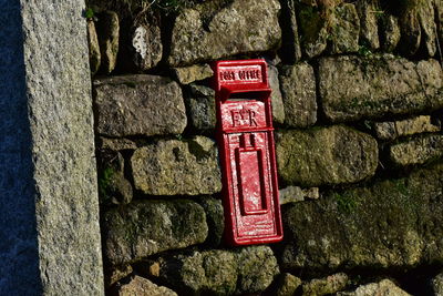 Information sign on stone wall