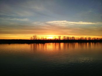 Scenic view of sunset over river
