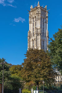 Low angle view of building against blue sky