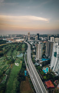 High angle view of street amidst buildings in city