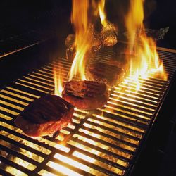 Close-up of meat on barbecue grill