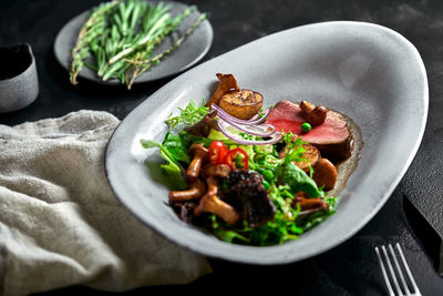 Close-up of food served on table