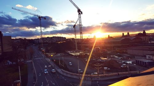 Panoramic view of city against sky during sunset
