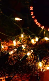 Close-up of illuminated lighting equipment
