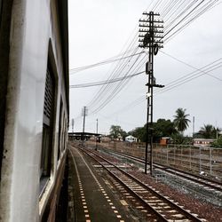 Railroad tracks against sky