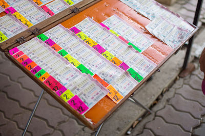 High angle view of lottery tickets on table