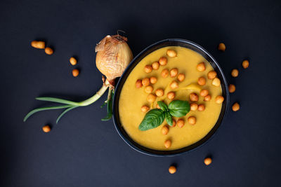 High angle view of food on table against black background