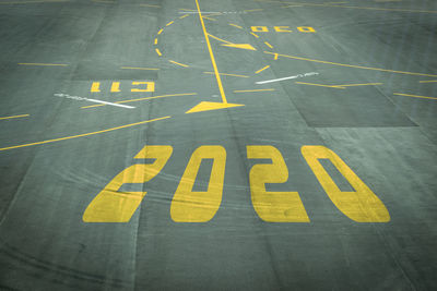 High angle view of 2020 numbers on runway