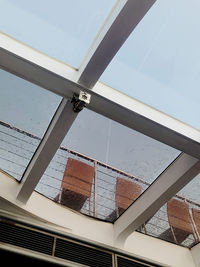 Low angle view of skylight against building