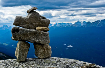 Stack of rocks against sky