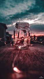 Close-up of glass jar on table