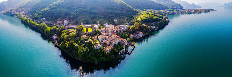 High angle view of trees by sea