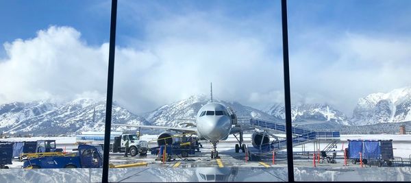 Panoramic view of snowcapped mountains against sky