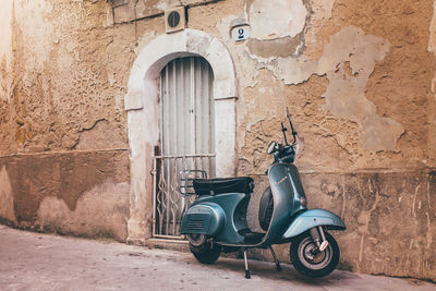 Bicycle parked outside house