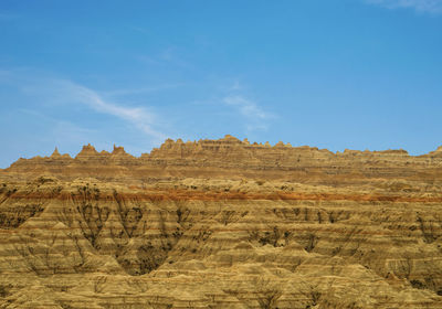 Scenic view of rock formations against sky