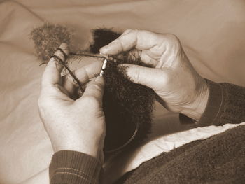 Close-up of woman knitting