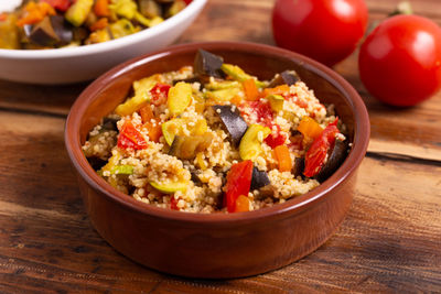 Close-up of cous cous salad in bowl on table