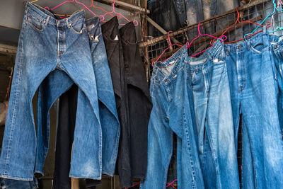 Jeans hanging for sale at market