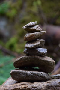Close-up of stack of pebbles on rocks
