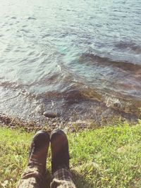 Low section of woman in water