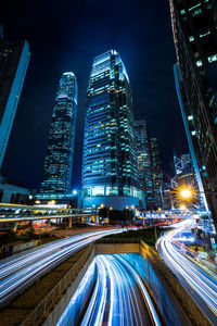 High angle view of illuminated buildings in city at night