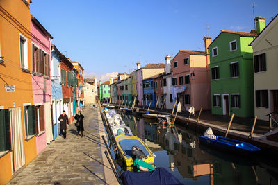 View of canal along buildings