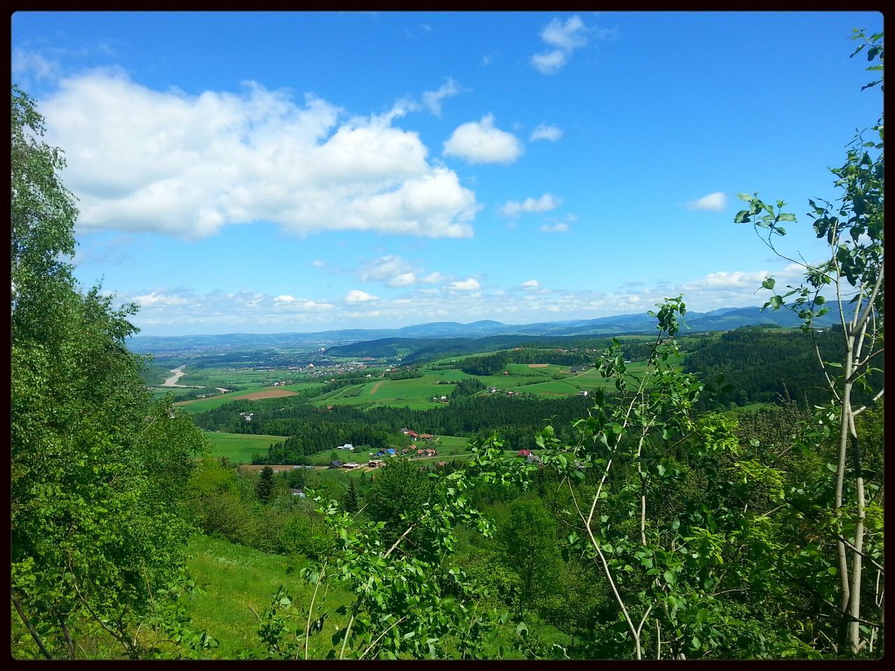 tranquil scene, sky, landscape, tranquility, transfer print, scenics, beauty in nature, mountain, green color, nature, growth, cloud, field, cloud - sky, plant, auto post production filter, tree, grass, horizon over land, non-urban scene