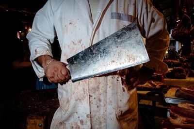 Man working at market stall