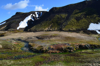 Steaming flowing hot spring in the volcanic landscape of hveragerdi iceland.