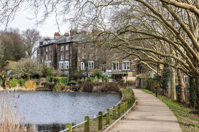 Scenic view of lake in city