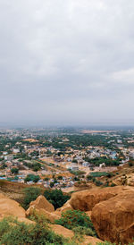 Aerial view of townscape against sky