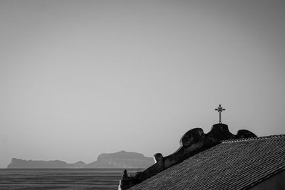 Low angle view of roof and building against sky