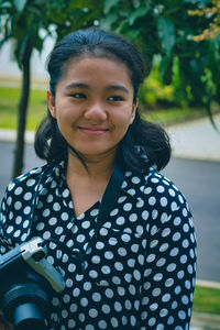 Portrait of a smiling young woman